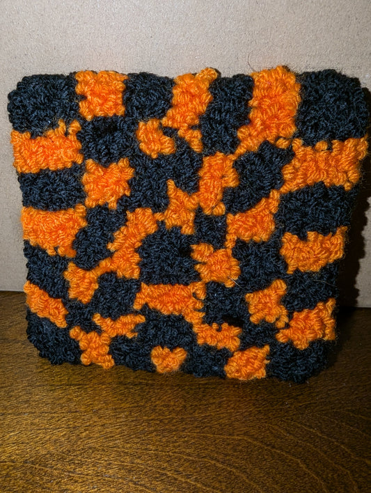 Orange and black coaster